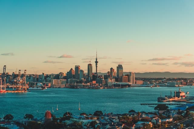 Auckland skyline at sunset - your future home in New Zealand