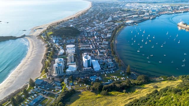 Aerial view of Tauranga and Mount Maunganui peninsula with harbour and beaches